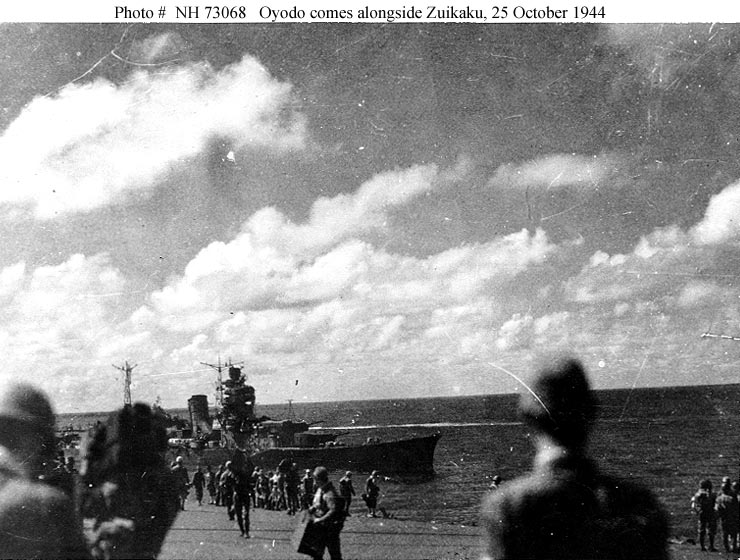 Japanese photo taken off Cape Engano showing HIJMS Oyodo alongside the carrier Zuikaku 25th Oct 1944 01