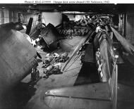 Asisbiz CV 10 USS Yorktown II hangar deck area showing some of her Grumman Helcats 1943 01