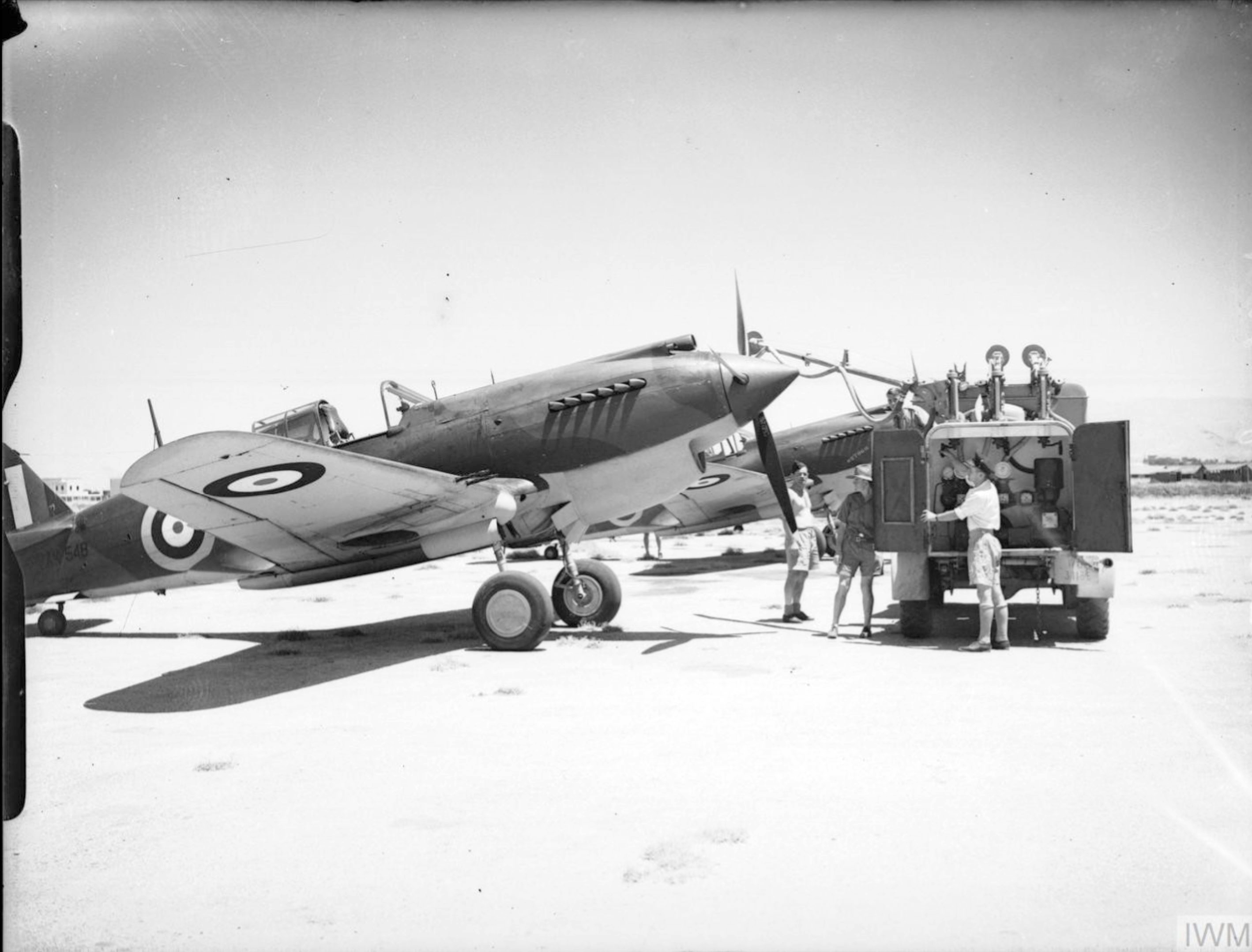 Curtiss Tomahawk IIbs RAAF 3Sqn AK548 being refuelled at Rayak Lebanon IWM CM1519
