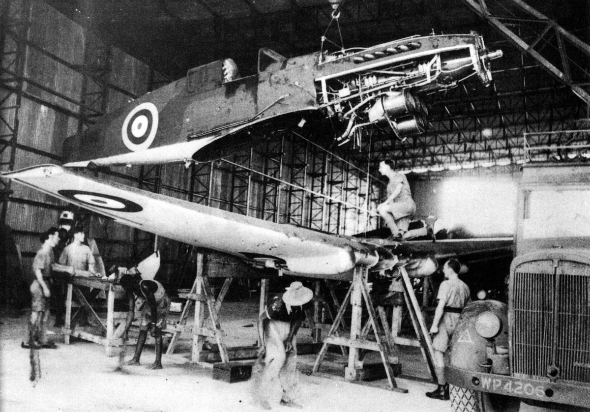 Curtiss P 40 Tomahawk being reasembled at Egypt 01