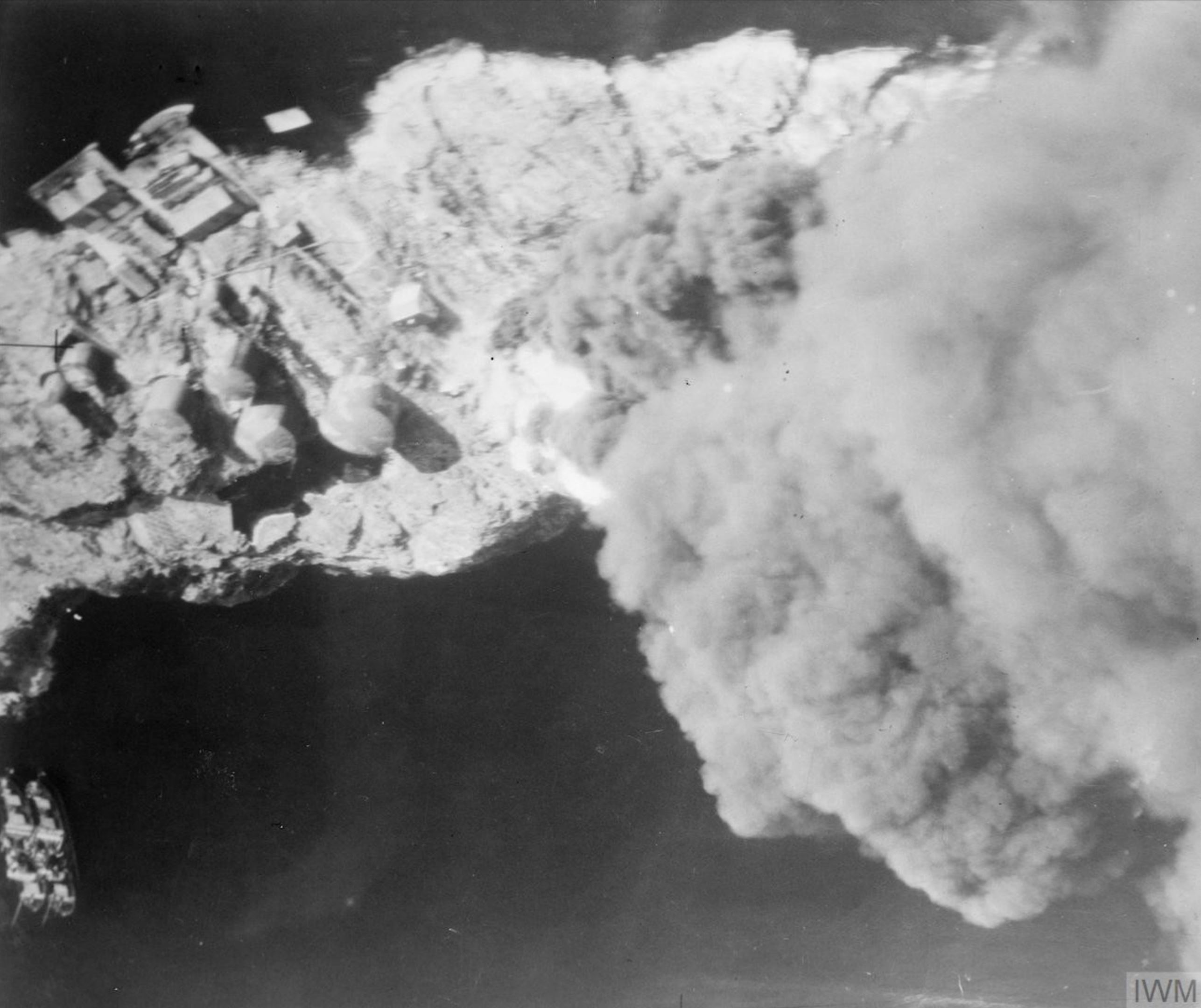 Fleet Air Arm Skuas attack the oil tanks and jetty at Dolvik near Bergen Norway 7th Aug 1940 IWM A3591
