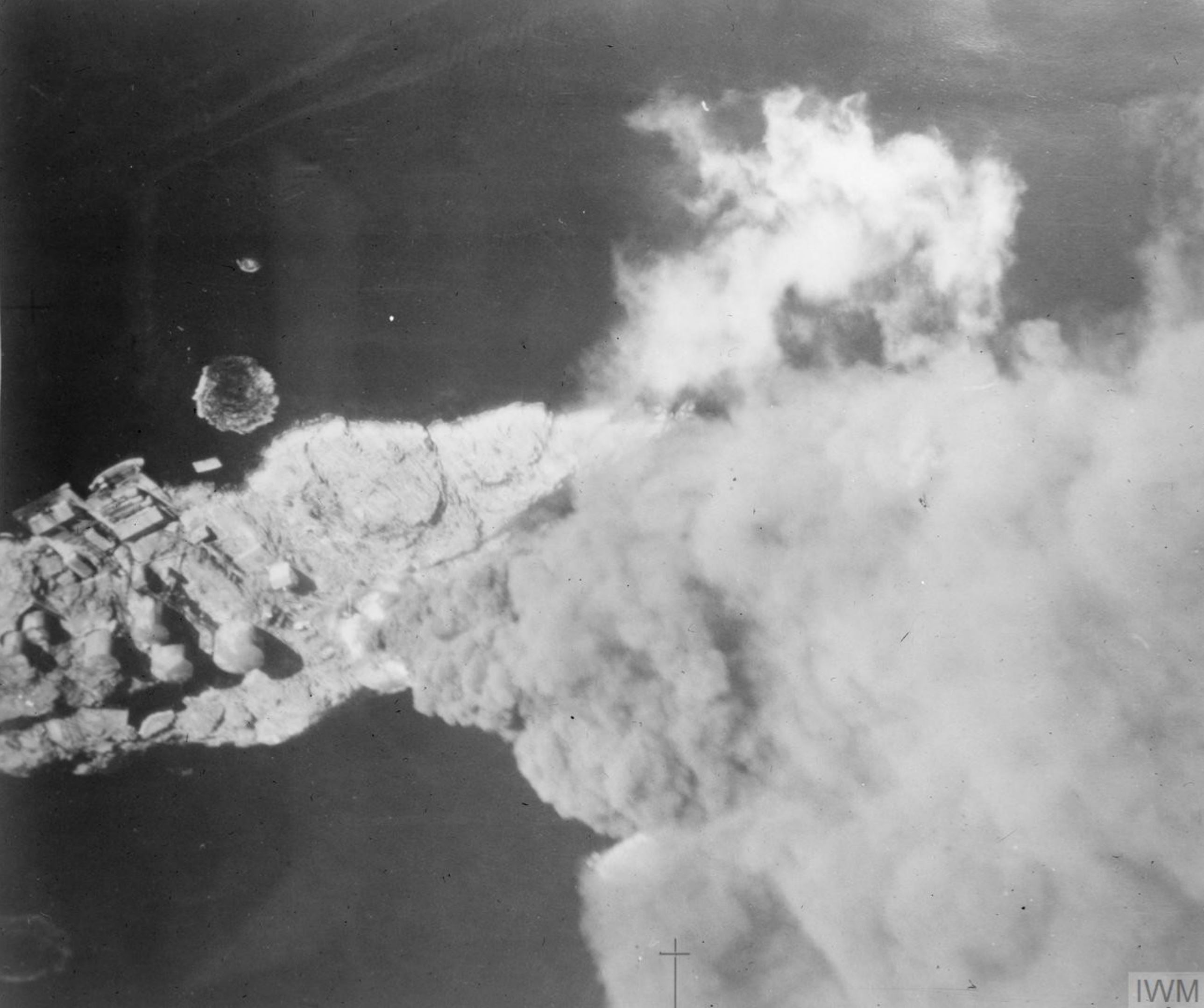 Fleet Air Arm Skuas attack the oil tanks and jetty at Dolvik near Bergen Norway 7th Aug 1940 IWM A3592