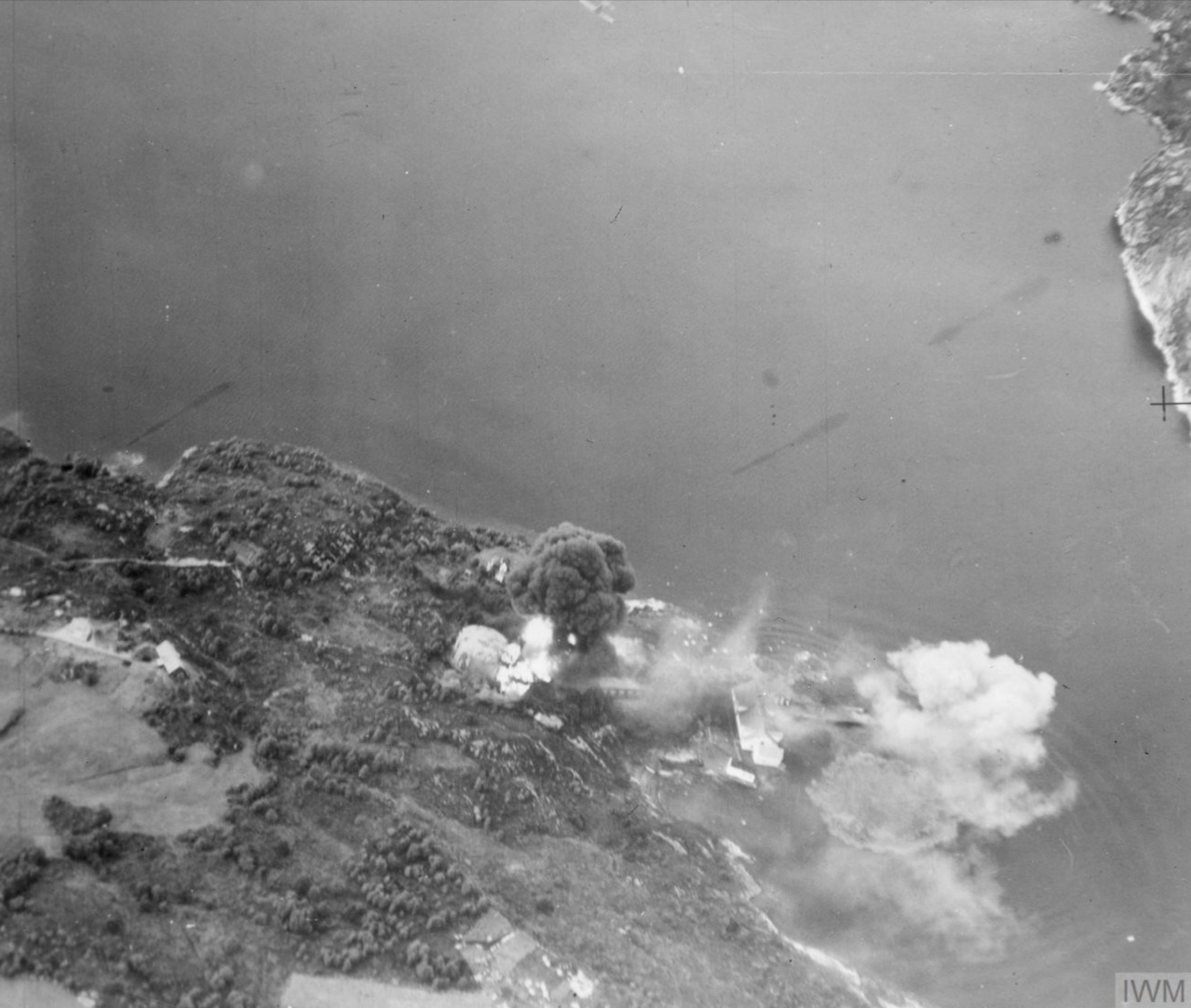 Fleet Air Arm Skuas attack the oil tanks and jetty at Dolvik near Bergen Norway 7th Aug 1940 IWM A3596