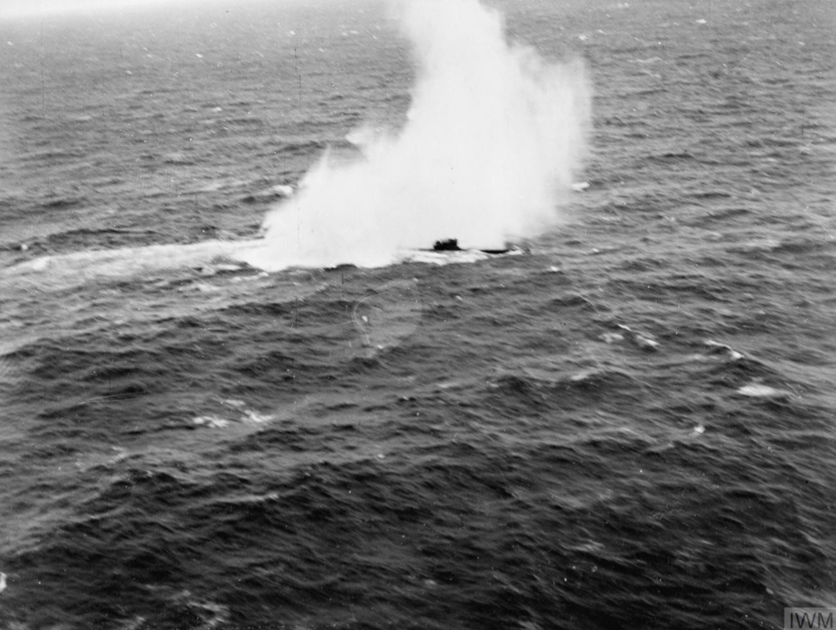Fleet Air Arm aircraft from HMS Fencer attacking a U boat with depth charges May 1944 IWM A23574