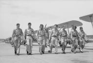 Asisbiz British and American cadets walk out to their machines at Bunker Hill Indiana IWM A26700