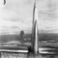 Asisbiz Fleet Air Arm Skuas attack the oil tanks and jetty at Dolvik near Bergen Norway 1940 IWM A84