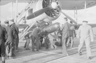 Asisbiz Fleet Air Arm Fairey Swordfish 5F being armed with a torpedo aboard HMS Ark Royal Apr 1941 IWM A3815