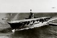 Asisbiz RN carrier HMS Ark Royal with Fairey Swordfish taking off as another approaches from astern 1939 NH79167