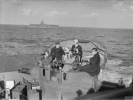 Asisbiz RN cruiser HMS Sheffield aircraft control tower with HMS Ark Royal background IWM A2300