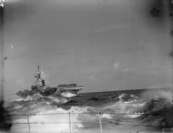 Asisbiz RN carrier HMS Formidable during a monsoon heads to Kilindini from Colombo IWM A10997