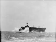 Asisbiz RN carrier HMS Furious steaming through rough seas Mediterranean 1941 IWM A4383