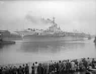 Asisbiz RN carrier HMS Implacable being towed slowly down the Clyde Scotland 4th Jun 1944 IWM A24108