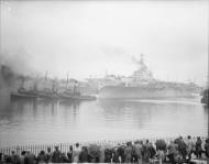 Asisbiz RN carrier HMS Implacable being towed slowly down the Clyde Scotland 4th Jun 1944 IWM A24109