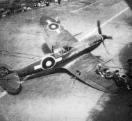 Asisbiz Fleet Air Arm Seafire aboard HMS Indefatigable flightdeck wartime photo 01