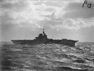 Asisbiz HMS Indomitable in choppy seas photographed from the Armed Merchant Cruiser Canton IWM A6650