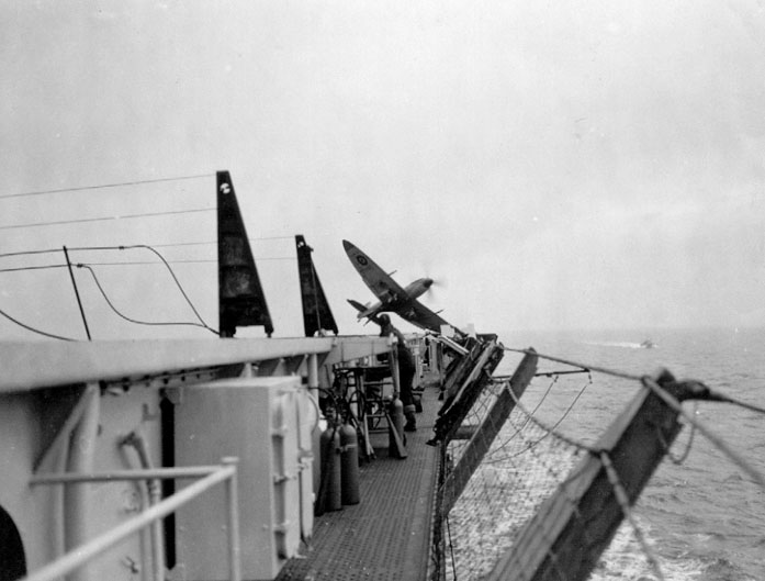 Fleet Air Arm Seafire executing a rather late go around aboard HMS Ravager D70 01
