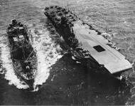 Asisbiz RN carrier HMS Victorious seen from the air being refueled by USS Cimarron Dec 1943 IWM A21747