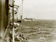 Asisbiz RN escort carrier HMS Bitter at sea with HMS Enchantress escorting the convoy off North Africa IWM A12711