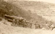 Asisbiz 11th Army troops using a Austrian 30.5cm motor being loaded during siege of Sevastopol 1942 ebay 01