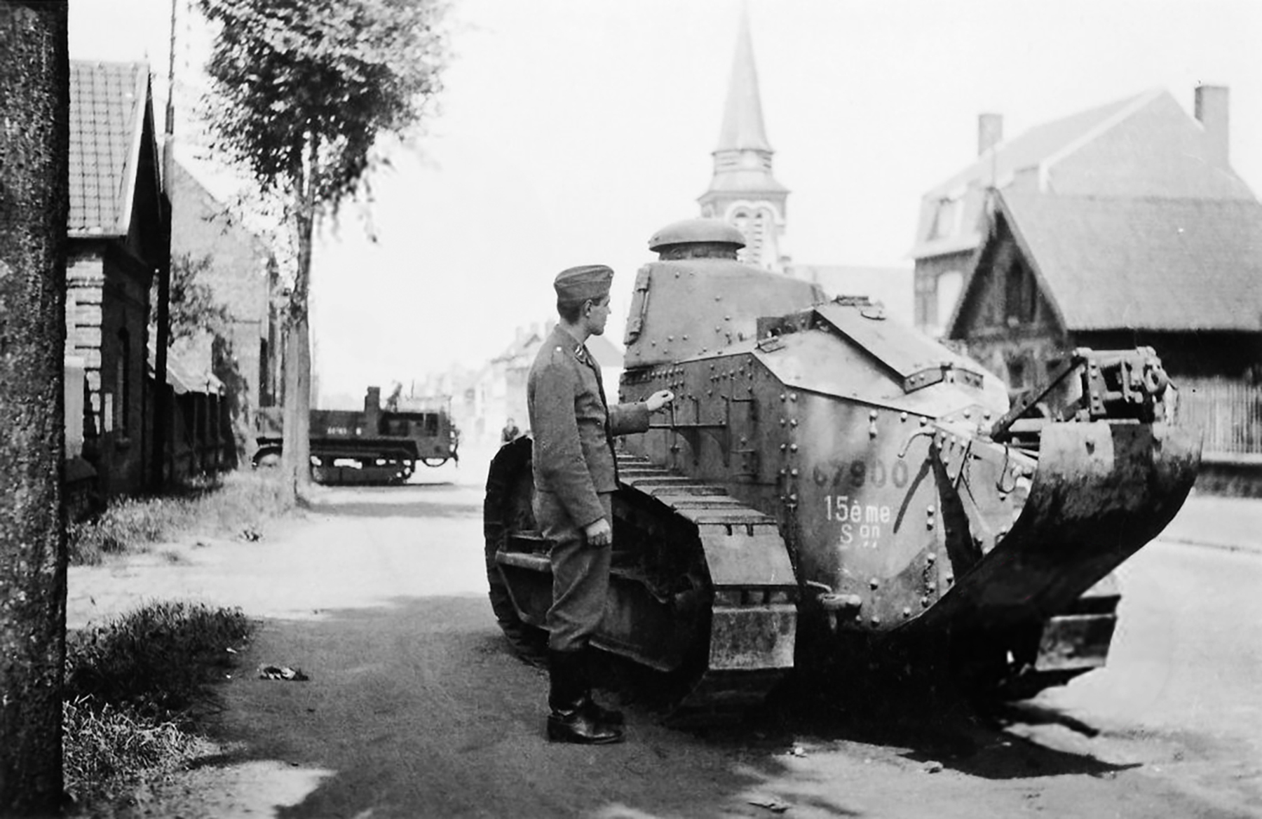 French Army Renault FT 31 tank sn 67900 being examined by German soldier after the fall of France 1940 01