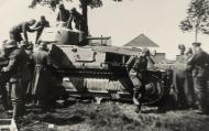Asisbiz French Army Somua S35 abandoned along a roadside being inspected by German forces France June 1940 ebay 01