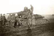 Asisbiz German 130th Armored Brigade inspecting a captured Soviet T 34 tank May 1942 ebay 01