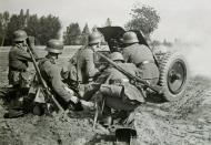 Asisbiz German Infranty PaK 35.36 caliber 37 mm light anti tank gun team firing at targets ebay 01