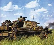 Asisbiz German Panzer PzKpfw III tank red 633 supported by German Infranty advances slowly forward 01