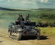 Asisbiz German column of trucks and Panzer PzKpfw IVs advancing into Russia 1941 01