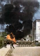 Asisbiz German soldiers take a break to survey damage inflected during street fighting Eastern Front 01