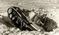 Asisbiz Soviet KV 1 heavy tank lies abandoned in a ditch after a stuka attack 1941