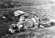 Asisbiz The carnage of war is vividly shown in this photo of a dead Russian soldier Polish Archives 01