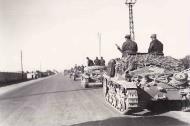 Asisbiz German armor Panzer PzKpfw II driving along the main road into Tunisia 1943 ebay 01