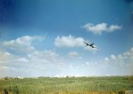Asisbiz British Beaufighter circles over a Tunisian Airfield May 1943 IWM TR852