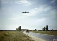 Asisbiz British Spitfire flies top cover for a road convoy Tunisia IWM TR1023