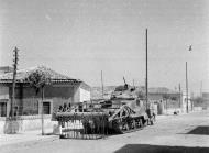 Asisbiz General Grant Scorpion flail tank in a Sicilian street 1943 NAM1975036313189