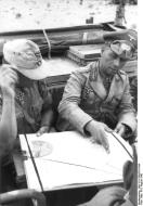 Asisbiz German Cmd GenLt Erwin Rommel discussing his plans with a commander Aug 1942 Bund 101I 786 0315 34A