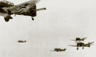 Asisbiz Luftwaffe Junkers Ju 87R Stukas from I Gruppe StG2 being escorted by JG27 Messerschmitt Bf 109Es in 1941 01