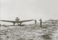 Asisbiz Luftwaffe Messerschmitt Bf 109F4 is guided onto the active runway showing the harsh desert conditions North Africa 01