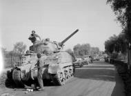 Asisbiz The crew of Aurora a M4 Sherman tank of 3rd County of London Yeomanry have a break Sicilian campaign 1943 NAM197503631417