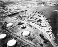 Asisbiz Aerial view of the Submarine Base with part of the fuel farm in the foreground looking southwest on 13th Oct 1941 80 G 189536