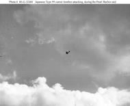 Asisbiz Archive USN photos showing a Japanese bomber during the attck on Perl Harbor Hawaii 7th Dec 1941 01