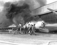 Asisbiz PBY Catalina patrol bomber burning at Naval Air Station Kaneohe Bay Oahu Pearl Harbor 7th Dec 1941 80 G 32836