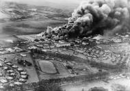 Asisbiz Planes and hangars burning at Wheeler Army Air Field Oahu 7th Dec 1941 NH 50473