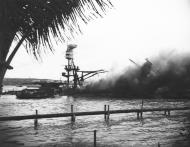 Asisbiz USS Arizona (BB 39) burning after the Japanese attack on Pearl Harbor 7th Dec 1941 80 G 32545