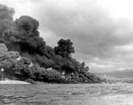 Asisbiz USS Arizona (BB 39) is sunk and burning with USS West Virginia (BB 48) sunk alongside USS Tennessee (BB 43) 80 G 32750