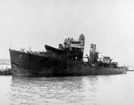 Asisbiz USS Cassin (DD 372) leaves dry dock at the Pearl Harbor Navy Yard 18th Feb 1942 NH 55063