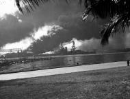 Asisbiz USS Nevada (BB 36) afire off the Ford Island seaplane base Pearl Harbor 7th Dec 1942 80 G 32457