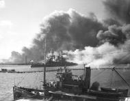 Asisbiz USS Nevada (BB 36) after the Japanese attack on Pearl Harbor 7th Dec 1941 80 G 32583
