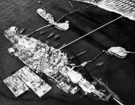 Asisbiz USS Oklahoma (BB 37) being prepared for refloating after she had been righted 20th Sep 1943 NH 64495